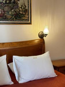 Katil atau katil-katil dalam bilik di Hotel Monte Cristo