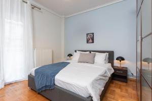 Ένα ή περισσότερα κρεβάτια σε δωμάτιο στο Houseloft CityView Hagia Sophia