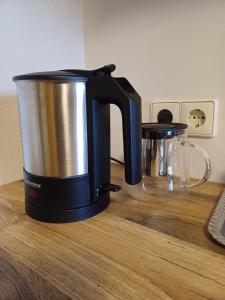 a coffee maker sitting on top of a counter at Modernes Apartment in altem Bauernhaus in Aflenz Kurort