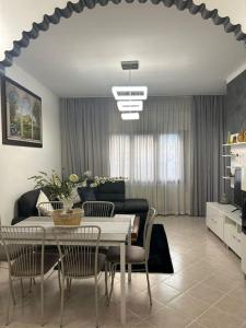 a living room with a table and a couch at Casa di Fati in Mestre +19 photos