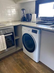 Kuchyň nebo kuchyňský kout v ubytování Depto de lujo en zona Carmelitas