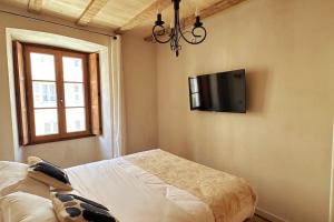 Et tv og/eller underholdning på Appartement prestige, cour Paoli