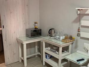 Kuchyň nebo kuchyňský kout v ubytování Meraki Upmarket Guesthouse