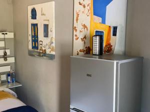 Postel nebo postele na pokoji v ubytování Meraki Upmarket Guesthouse