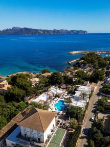 an aerial view of a resort and the ocean at Prinsotel Mal Pas in Alcudia