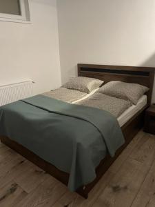 Rado Apartments tesisinde bir odada yatak veya yataklar