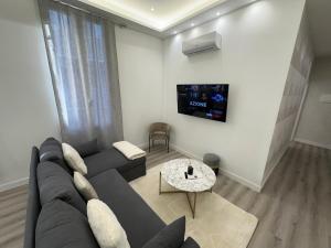TV a/nebo společenská místnost v ubytování Elsa & Reseda Apartments