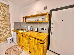 a kitchen with a wooden counter in a room at Zen house in Kas