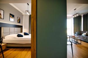 Łóżko lub łóżka w pokoju w obiekcie Apartament No 61 Blue Holiday Home Zator