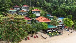 an aerial view of a resort on a beach at Perhentian Chomel Chalet in Perhentian Islands