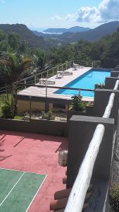 a view of a swimming pool from a house at Pousada La Dolce Vita Paraty in Paraty