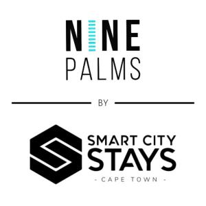 un logo con las palabras nne Plains y smart city stays en 9 Palms by Smart City Stays, en Ciudad del Cabo