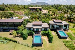 an aerial view of a house with a swimming pool at Blue Wild - Yala - Plastic Free & Sustainable in Tissamaharama
