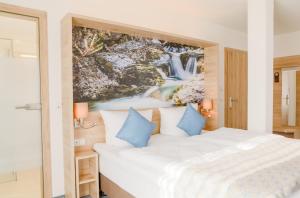 Postelja oz. postelje v sobi nastanitve R&R Residenzen HOTEL