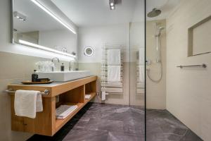 Un baño de Hotel Der Bär