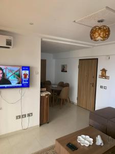 TV a/nebo společenská místnost v ubytování Résidence Amwej
