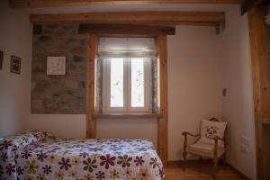 Posteľ alebo postele v izbe v ubytovaní La Casa de Santa Olalla