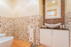 Koupelna v ubytování Villa Vescovado appartamento in casa vacanza