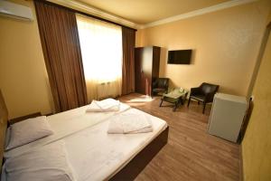 Letto o letti in una camera di Express Hotel