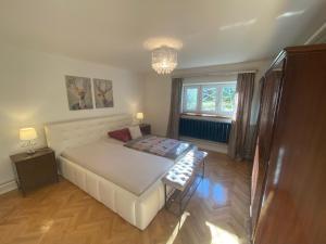 Posteľ alebo postele v izbe v ubytovaní Villa Trófea
