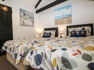 Postel nebo postele na pokoji v ubytování The Granary