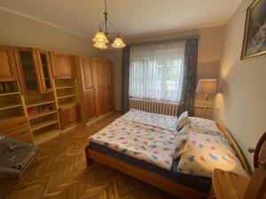 Posteľ alebo postele v izbe v ubytovaní Villa Trófea