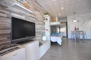 A television and/or entertainment centre at RNET - Puerto Simona 1-9 Roses Costa Brava