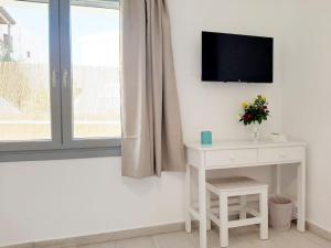 Et tv og/eller underholdning på Cozy town house