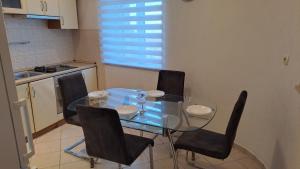 Kuchyň nebo kuchyňský kout v ubytování Apartman Biserka + 18 fotografií