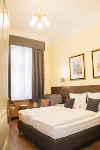 Letto o letti in una camera di Private Comfort STEPHANSPLATZ - SELF CHECK IN