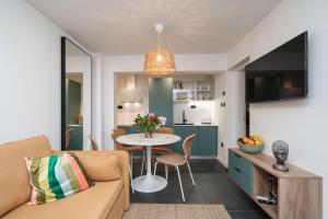 Kuchyň nebo kuchyňský kout v ubytování Apartments Alex