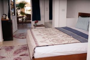 a bedroom with a bed in a room at Sunshine Divers Club in Sharm El Sheikh