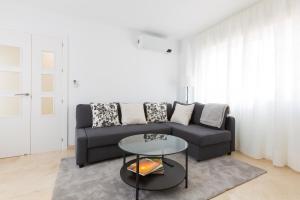 Χώρος καθιστικού στο OceanVibe Loft MalagaFlat