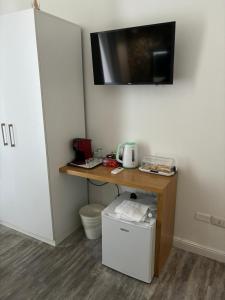 A television and/or entertainment centre at Eden LUXURY ROMA Még 30 kép