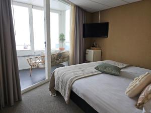 Postel nebo postele na pokoji v ubytování Hotel Restaurant Solskin