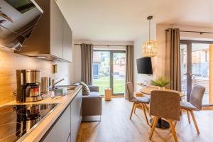 Kuchyňa alebo kuchynka v ubytovaní Kreischberg Suites by ALPS RESORTS