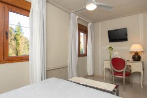 Μια τηλεόραση ή/και κέντρο ψυχαγωγίας στο Hotel Bufon de Arenillas
