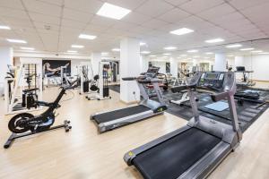 a gym with treadmills and cardio machines at Alexandre Gala in Playa de las Americas +50 photos