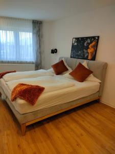 Postel nebo postele na pokoji v ubytování Gästezimmer / Weingut Peter