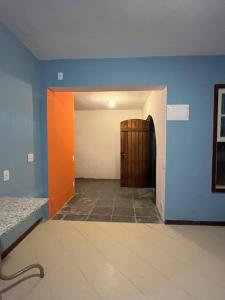 an empty hallway with a door in a room at Reserva 69 Hostel in Sao Paulo