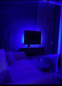 En TV eller et underholdningssystem på Mirto Luxury Appartment