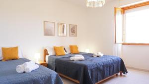 Ένα ή περισσότερα κρεβάτια σε δωμάτιο στο Lemon House