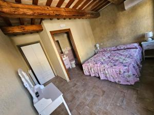 Katil atau katil-katil dalam bilik di Agriturismo Il Raggio di sole di Orpello
