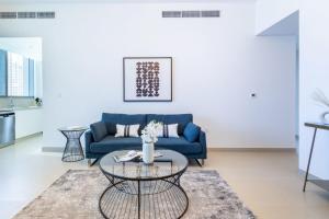 Зона вітальні в Silkhaus modern 2BDR with Beach and Dubai Eye views