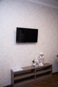 Televízia a/alebo spoločenská miestnosť v ubytovaní Apart-Sol Polyana Resort