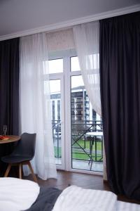 Posteľ alebo postele v izbe v ubytovaní Apart-Sol Polyana Resort + 37 fotografií