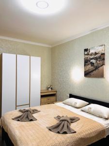 Posteľ alebo postele v izbe v ubytovaní Apart-Sol Polyana Resort