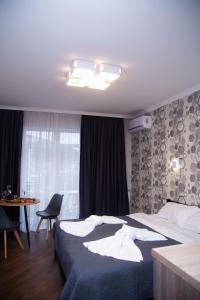 Posteľ alebo postele v izbe v ubytovaní Apart-Sol Polyana Resort