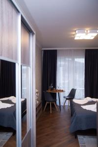 Posteľ alebo postele v izbe v ubytovaní Apart-Sol Polyana Resort