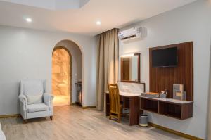 TV a/nebo společenská místnost v ubytování La Fattoria Resort